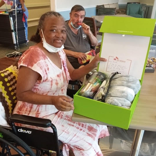 Girl in hospital with Cheeriodicals frog and box